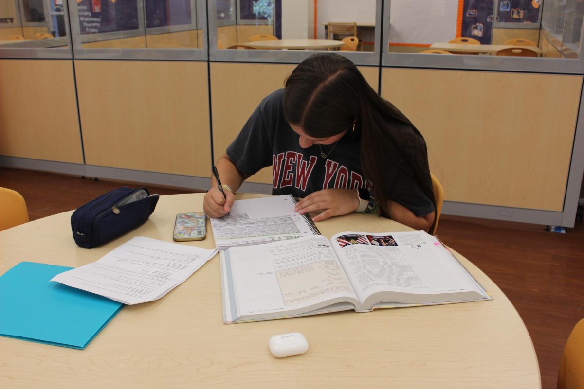 Senior Whitney Race studying in the Hub on Monday.