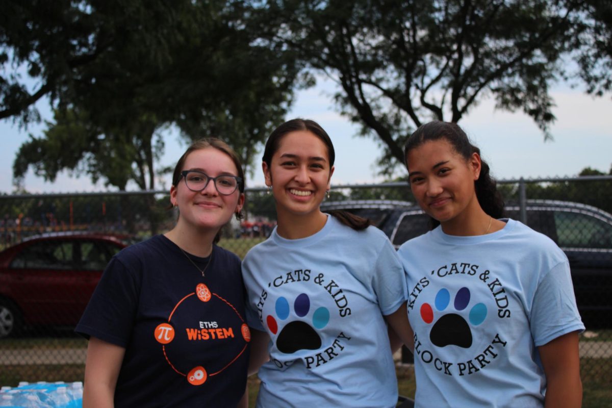 Kate Flint, Sofia Reel and Simone Llanes support WiSTEM at the Block Party.