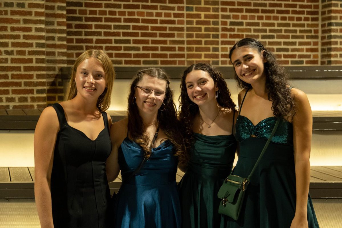 Abigail Perry, Amanda Farris, Celia Jeff, and Talia Reichlin get together at the dance