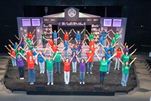 From left-to-right and front to back: Devika Clark, Elliot Hoffner, Sam Kalil. Paula Hlava, Mira Walsh, Leela Wittenberg-Trubowitz, Libby Moreno, Sam Consiglio, Jonah Wright, Harper Nowlin, Max Beck, Marcia Utomo, Noah Swift, Tinsae Geyer, Emmy De La Torre, Vanessa Harvey, Vivian Solomon, Harry Morgan, Remi Adedeji, Pasha Irons Rosin, Charles Halliday, Nytasha Sharpe, Finley Weiler, Ash Mullenix, Brendan Mallers, Margaret Dillingham, Viki Golemis, Ethan Lloyd, Templeton Steinwedel, Kalani Joo, Sophie Long, Atisa D’Abdon, Sachin Jain, Tyler Press, Mara Matthews, Scythe Malone, Rocco Dipadova, Gemma Callam, Tristan Bond, London Thornton, Sadie Corey, Nathan Kane put the Y in YAMO.