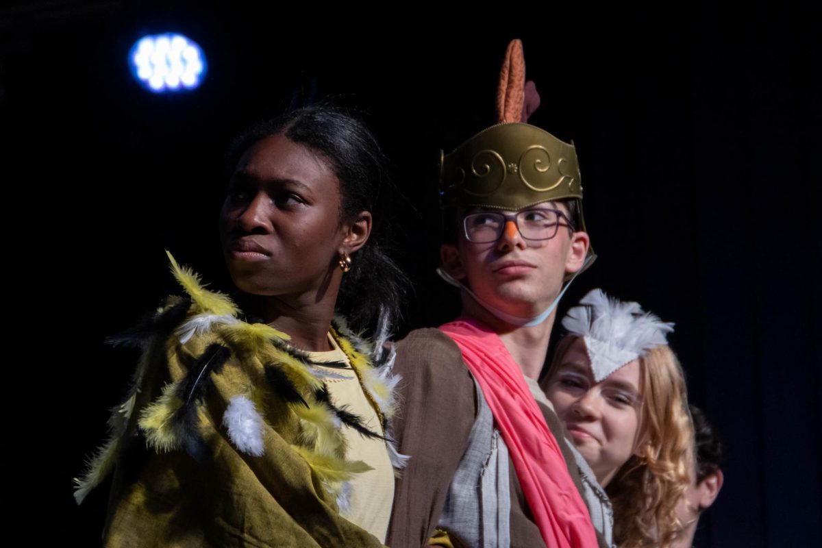 Destiny Alabi, Jasper Harris, and Lola Mullenix take the stage.