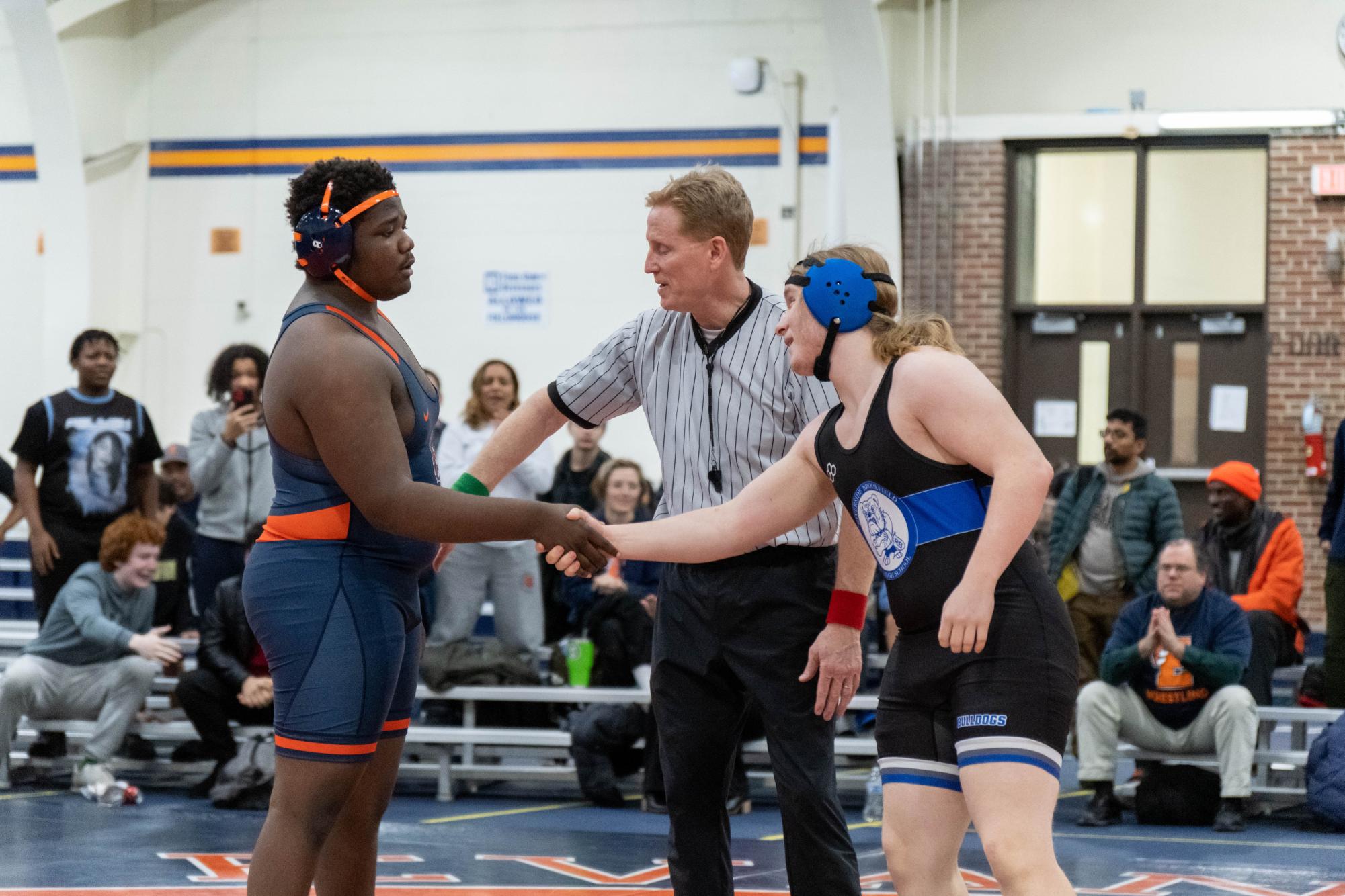 Jeremy Marshall shakes hands with his opponent.