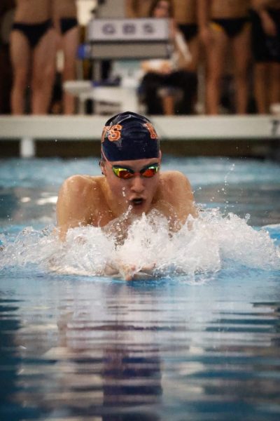 Hunter Kleinschmidt dives under.