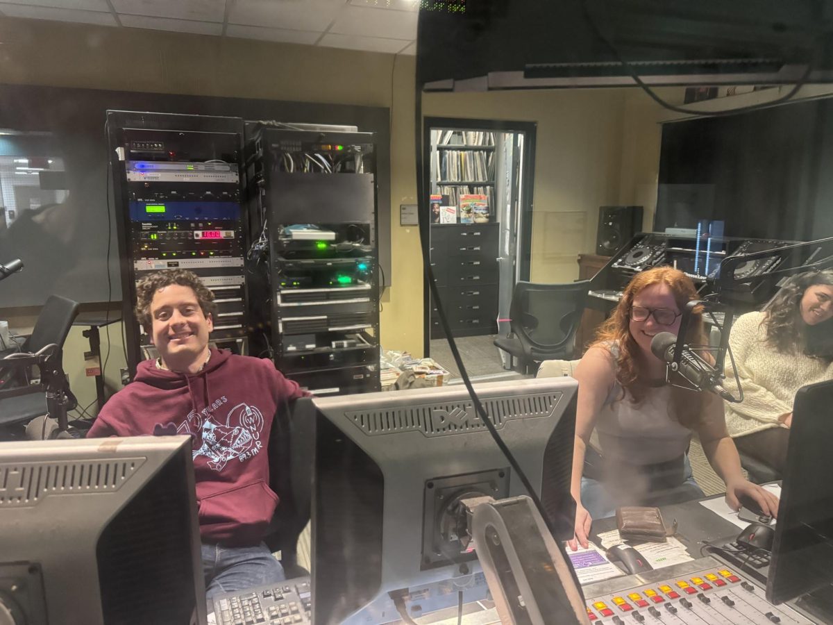 From left, WNUR General Managers Jon Myers and Madeleine Coyle and apprentice Carleigh O'Marra play a Wednesday night set.