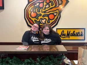 Miriam Cortelyou (11) and Amia Huber (11) on the job at Lou Malnati’s Pizzeria.